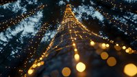 Magical string lights creating cone shape against dark night sky with bokeh effect and evergreen trees silhouettes, festive winter holiday atmosphere.