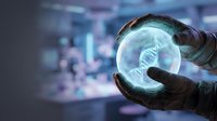 Hands holding glowing DNA helix sphere against blurred digital background, representing biotechnology, genetic research, and scientific innovation in modern laboratory settings.