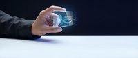 Businessman hand holding futuristic holographic play button interface with glowing digital elements for multimedia and technology presentations.