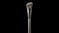 Makeup brush with soft gray bristles and metallic handle isolated on transparent background, ready for beauty, cosmetics, and design projects including t-shirts, clipart, and print-on-demand products.