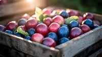 Fresh organic cranberries and blueberries in rustic wooden box, close up view with soft natural lighting and shallow depth of field for food photography.