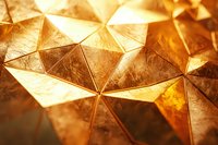 Golden geometric metallic surface with triangular facets creating abstract luxury pattern, illuminated with warm light showing textured reflective details.