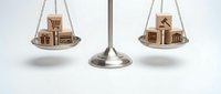 Work life balance concept with wooden blocks on metal scales showing house and office symbols for career and personal time management decisions.