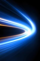 Dynamic blue and white light trails curve against dark background creating futuristic motion effect, with orange accent streak adding warmth and depth.