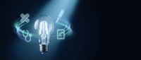 Glowing lightbulb with digital healthcare icons floating around it representing medical innovation and technology solutions for modern medicine.