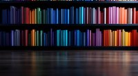 Colorful book spines arranged by rainbow colors on dark wooden shelves creating spectrum effect with reflection on glossy floor surface in library or bookstore.