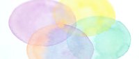 Watercolor circles in pastel rainbow colors overlapping to create soft blended hues on white background for creative design projects and artistic layouts.
