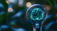 Glowing neon brain inside light bulb on dark background with bokeh lights, representing innovation, artificial intelligence and creative thinking process.