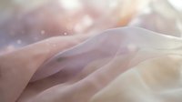 Soft flowing fabric with gentle light rays and bokeh effects creating dreamy ethereal atmosphere for wedding fashion luxury textile backgrounds.