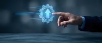 Businessman hand touching glowing digital gear with upward arrow symbol representing growth, progress and business optimization in futuristic technology concept.
