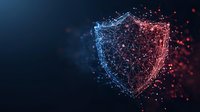 Glowing digital shield made of connected dots and lines transforming from blue to red, symbolizing cybersecurity and data protection on dark background.