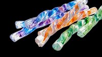 Colorful glass smoking pipes with swirled blue, purple, orange and green designs isolated on transparent background, ready for clipart, print-on-demand products, t-shirt designs and sublimation projects.