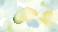 Soft pastel watercolor shapes in gentle yellow, blue and green tones create dreamy abstract background with delicate floating organic forms. Ideal for wellness designs.