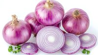 Fresh red onion bulbs and sliced rings with parsley garnish on white background, raw organic produce for cooking and food preparation.