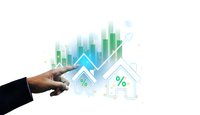 Businessman hand pointing at digital real estate market analytics with property icons, growth charts and percentage rates for investment planning.