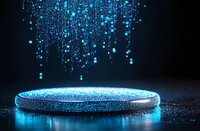 Glowing blue particles falling onto illuminated round platform against dark background, creating magical atmosphere for product display presentation.