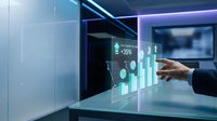 Businessman touching holographic data visualization with upward trending charts and financial metrics on transparent digital display in modern office environment.