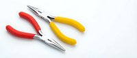 Professional pliers set with red and yellow rubber grip handles isolated on white background for tool and hardware projects.