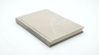 Closed hardcover book with beige linen texture cover isolated on white background for publishing and literature design projects.
