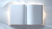 Open blank book with empty white pages illuminated by soft glowing light and casting gentle shadows, creating mystical atmosphere for reading or storytelling concept.