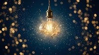 Vintage Edison bulb glowing warmly against dark blue background with golden bokeh lights creating magical atmosphere for holiday decorations and cozy interior design.