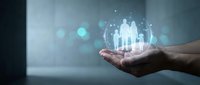 Human hands holding glowing holographic family figures with digital light effects representing healthcare protection and insurance coverage concepts.