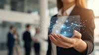 Professional businesswoman holding digital network connections and data visualization in modern office environment for technology presentations.