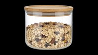 Glass jar with bamboo lid filled with granola and dried fruits, isolated on transparent background. Great for food, kitchen, and healthy eating designs.