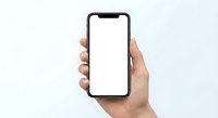 Hand holding modern smartphone with blank white screen mockup isolated on white background for app presentation and mobile interface design.