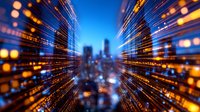 Abstract urban night cityscape with motion blur effect and glowing light trails creating dynamic perspective lines against blue sky background. Digital technology concept.