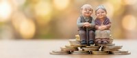 Elderly couple figurines sitting on stack of coins representing retirement savings, financial planning and pension fund investment for senior years.