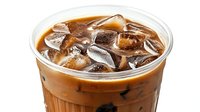 Refreshing iced coffee drink with milk in clear plastic cup, ice cubes floating on top, creamy brown color gradient, close up view on white background.