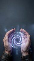 Two hands holding a glowing purple spiral vortex with digital particles and light effects against dark background. Concept for technology, innovation, energy, and future.