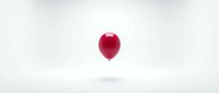 Single red balloon floating against white cloudy sky background for party celebration birthday anniversary greeting card design and festive decoration.