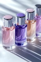 Elegant glass bottles with pink and purple liquid cosmetics casting long shadows on white surface, luxury beauty product photography for advertising.