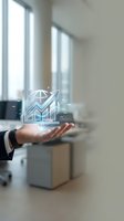 Businessman holding glowing holographic growth chart with upward arrow in modern office with windows, representing financial success, data analytics, and business growth strategy.