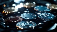 Casino poker chips in dark atmospheric lighting with blue and red colors reflecting on glossy surfaces. Gambling concept.