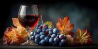 Red wine glass with fresh grapes and autumn leaves on wooden surface. Seasonal harvest composition for winery, restaurant menus and fall celebrations.