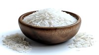 White basmati rice grains in wooden bowl on clean background for cooking and food preparation projects.