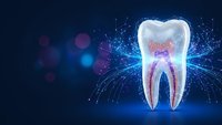 Futuristic digital tooth with glowing energy field and particles on dark blue background for dental technology and healthcare innovation concepts.
