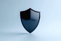 Metallic black shield emblem floating on light background, symbolizing protection and security in modern minimal style. Suitable for cybersecurity concepts.