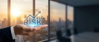 Businessman holding risk management icon with upward arrow against city skyline at sunset, representing financial growth and strategic planning for corporate success.