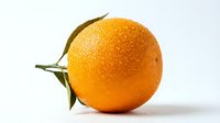 Fresh orange with green stem and leaves isolated on white background, suitable for food, nutrition, and culinary design projects.