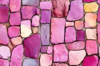 Colorful stone wall texture in shades of pink and purple creates mosaic pattern with rough surface and irregular shapes. Seamless background for design projects.
