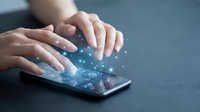 Female hands touching smartphone screen with glowing digital network connections and data points for modern technology and communication concepts.
