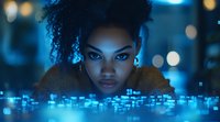 Young African American woman with natural curly hair illuminated by blue neon lights and digital data visualization elements, creating futuristic cyberpunk atmosphere.