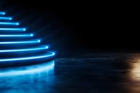 Glowing blue neon spiral staircase steps in dark space with reflective floor surface creating futuristic architectural atmosphere for technology concept.