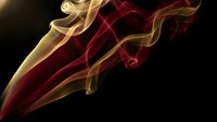 Abstract colorful smoke waves flowing on black background creating elegant curved patterns for modern graphic design and artistic projects.