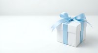 White gift box with light blue satin ribbon and bow on clean white background. Elegant present packaging for celebrations, holidays, and special occasions.