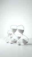 Collection of clear glass hourglasses with white sand on neutral background for time management and productivity concepts.